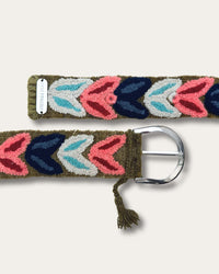 Both ends of the Morera belt: silver-tone D-buckle with tassel and metal plate with the Ayni Ppacha name