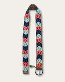 Morera belt at full length: olive-green sheep wool, hand-embroidered throughout with arched leaves in navy, coral, light blue and natural white