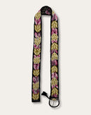 Yagua belt at full length: black sheep wool, hand-embroidered throughout with leaves in gold, olive and pink