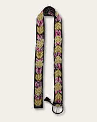Yagua belt at full length: black sheep wool, hand-embroidered throughout with leaves in gold, olive and pink