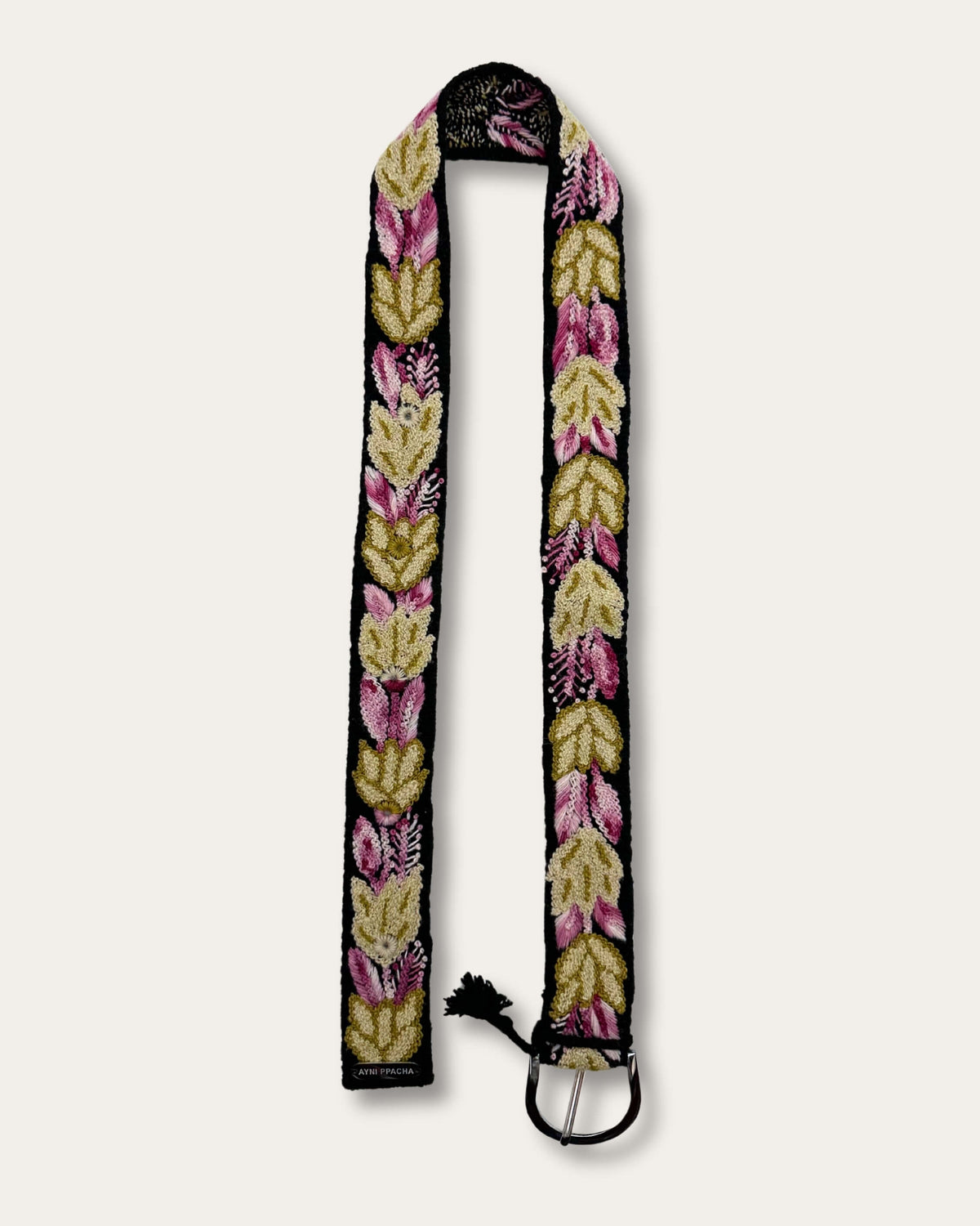 Yagua belt at full length: black sheep wool, hand-embroidered throughout with leaves in gold, olive and pink